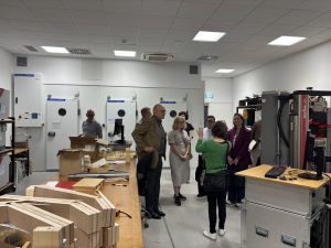 Andreja Kutnar guiding the guests through the building and laboratories